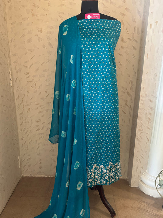 Batik print cambric cotton suit with aari work border and batik semi chiffon dupatta