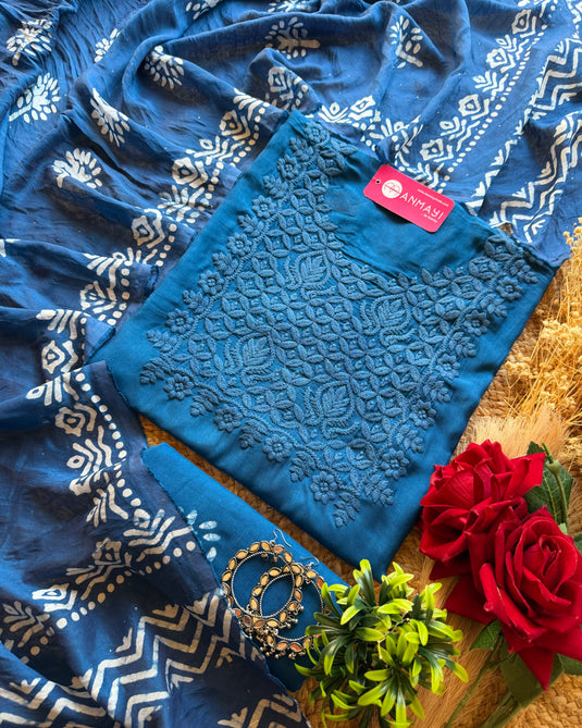 Muslin printed suit with chikan work neck and highlights dupatta