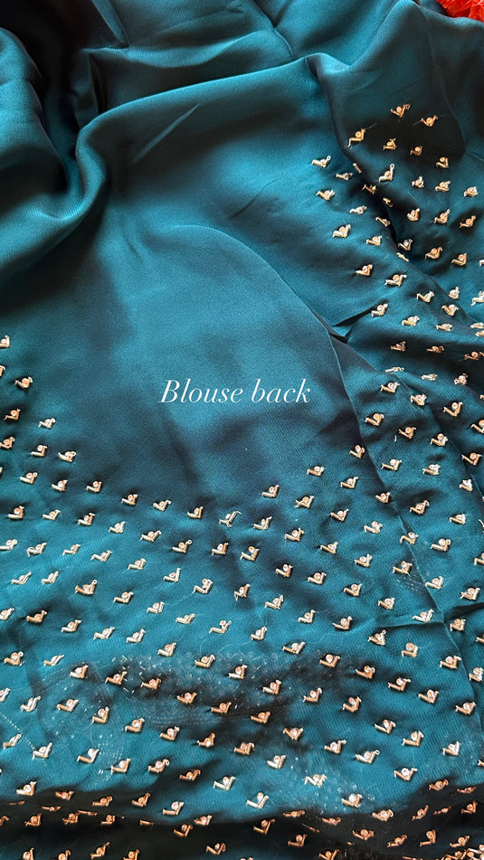Stone border chinnon plain saree with hand embroidered blouse