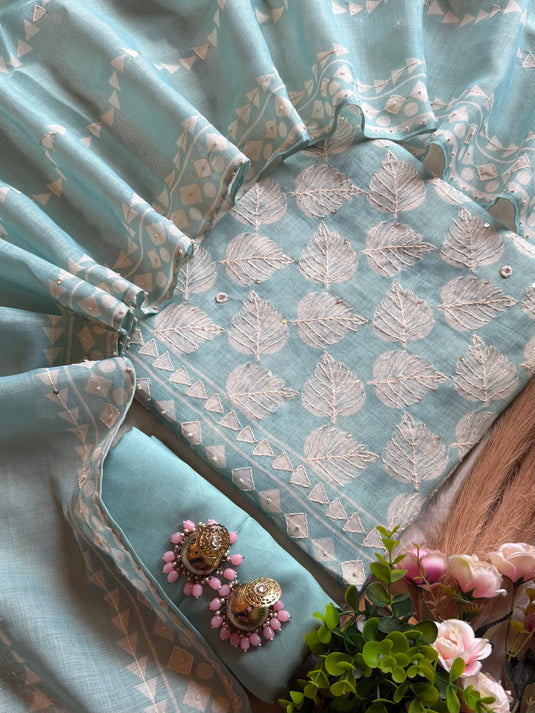 Linen highlighted crochet suit set with tassel dupatta
