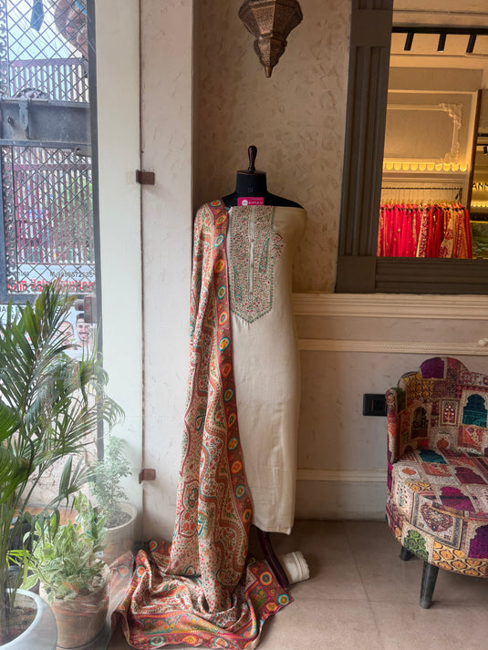 Silk ivory position print suit set with Kani weave dupatta