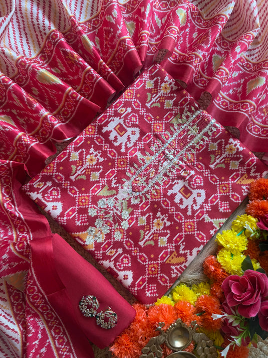 Semi Tussar pita neck patola print suit set