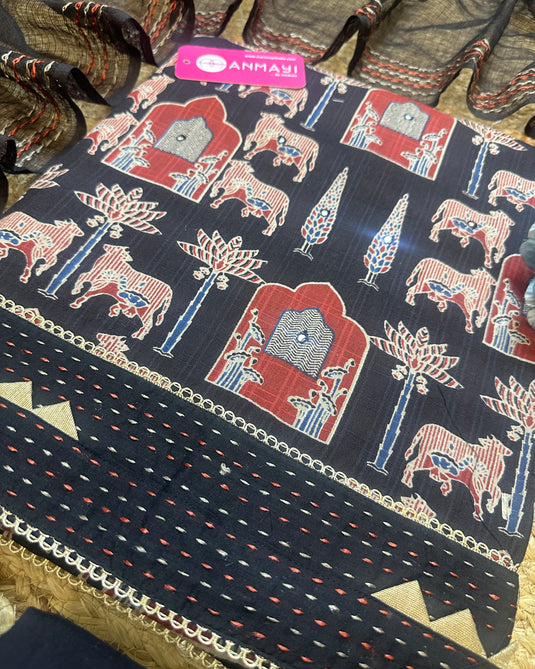 Pichwai print cambric cotton suit with weaved border