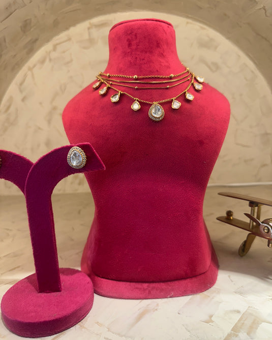 Layered chains with drops and earrings