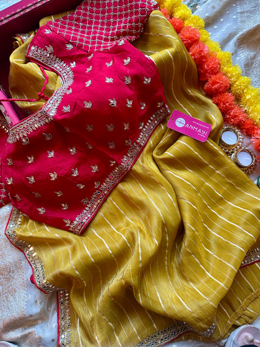 Stripes yellow mirror work georgette saree with embroidered raw silk blouse