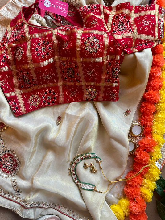 Shimmer ivory mirror work saree with red gharchola embroidered blouse