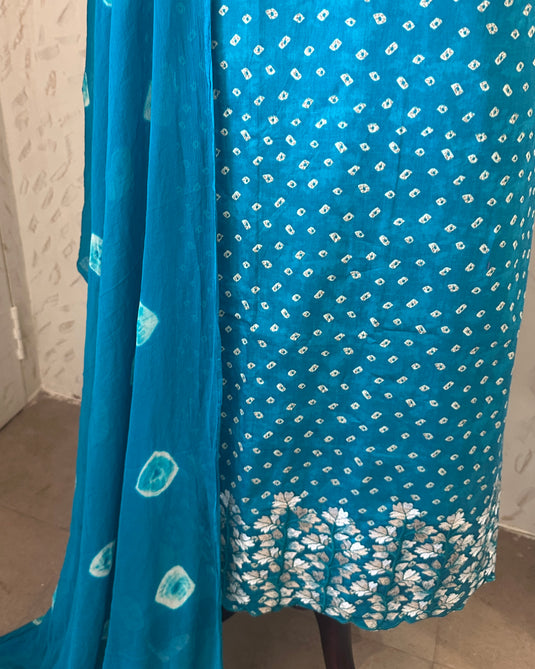 Batik print cambric cotton suit with aari work border and batik semi chiffon dupatta