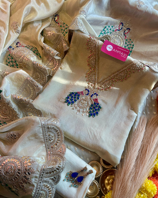 Ivory peacock shimmer silk suit set with pita and dori work