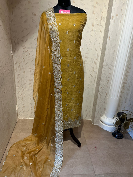 Crushed shimmer silk suit set with intricate dori work and organza dupatta