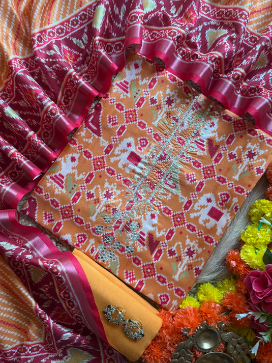 Semi Tussar pita neck patola print suit set