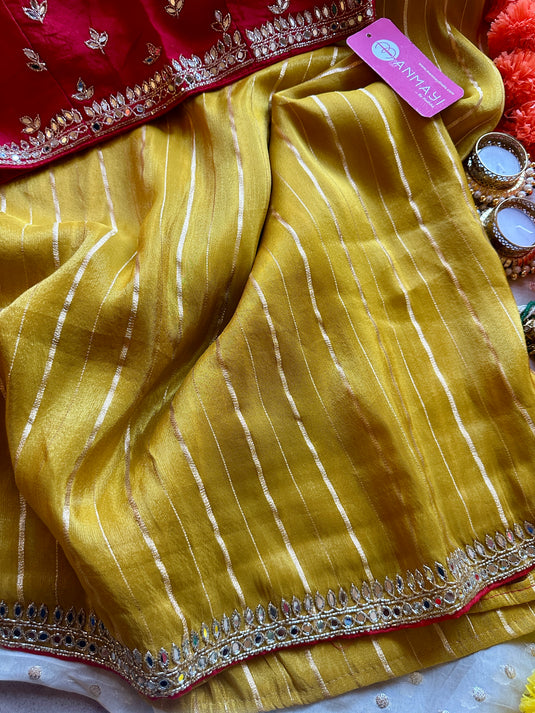 Stripes yellow mirror work georgette saree with embroidered raw silk blouse